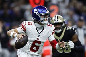 Jaxson Dart #6 of the New York Giants looks to pass in the game against the New Orleans Saints.